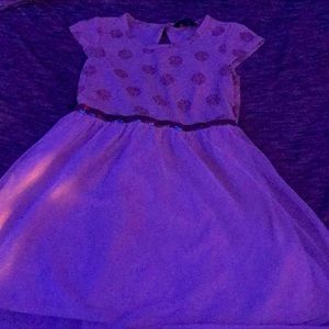 That’s a wonderful dress from George it’s a size 7-8 in little girls